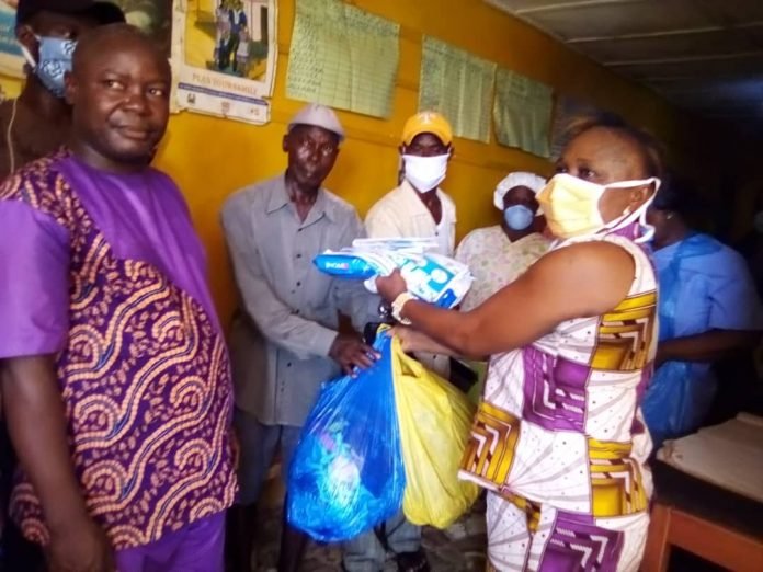 COVENANT NEWSPAPER - CONSTITUENCY 113 MP PRESENTS MASKS TO THE KOLA TREE HEALTH POST